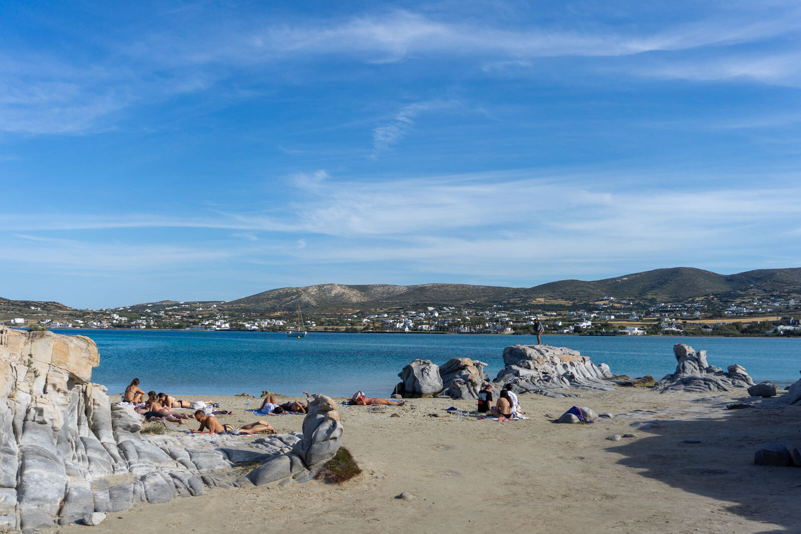 People swimming and sunbathing at Kolymbithres beach in Paros