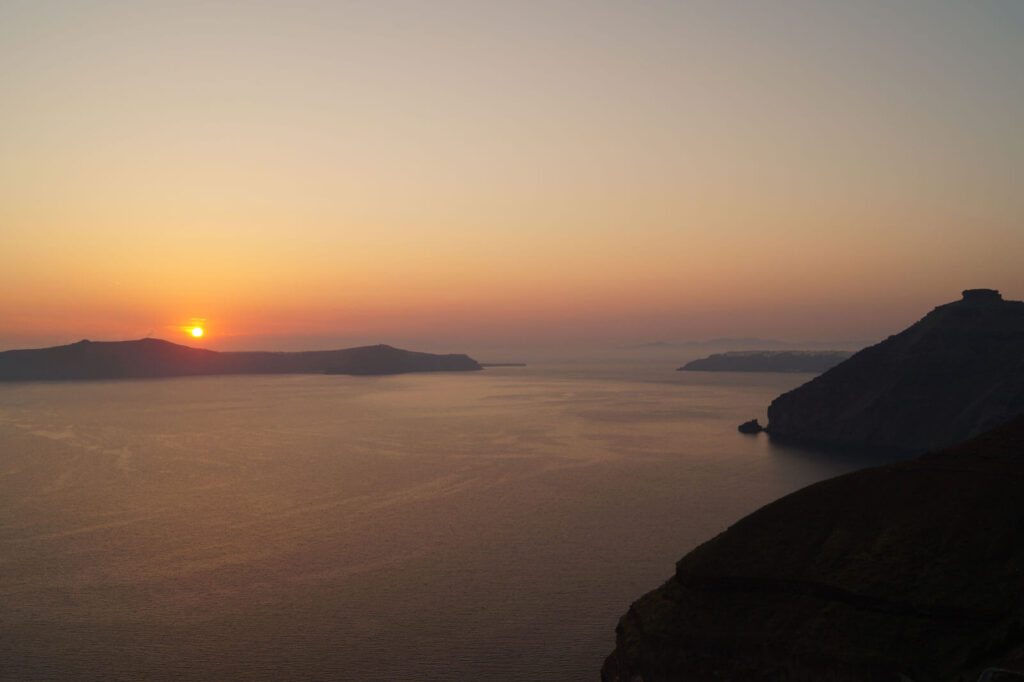 Sunset in Santorini over the Aegean sea